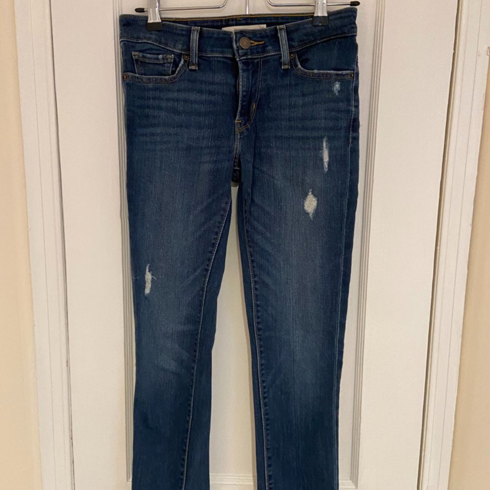 Distressed Levi's skinny jeans